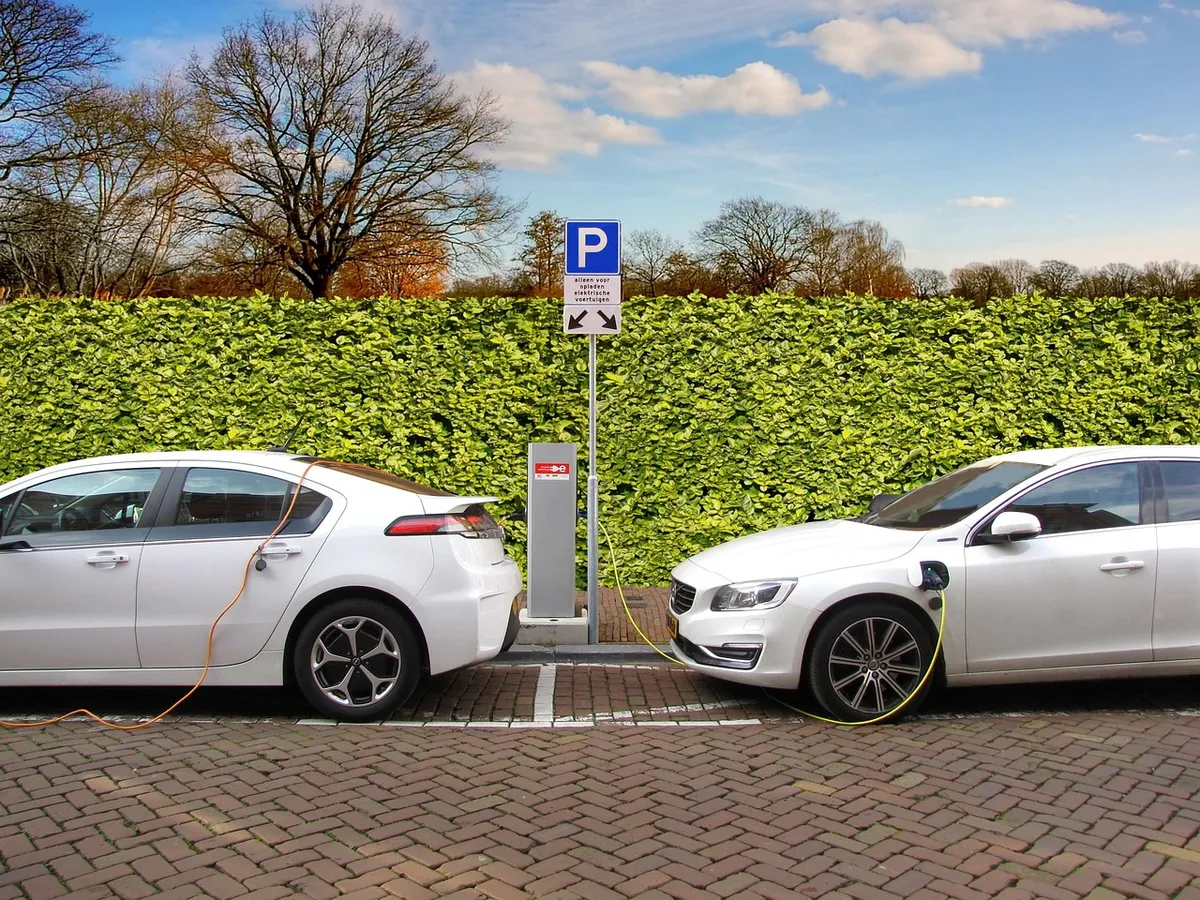 electric car, hybrid car, load, charging post, charging station, energy load, power cable, parking spot, opel ampera, volvo, environment, clean fuel, street sce