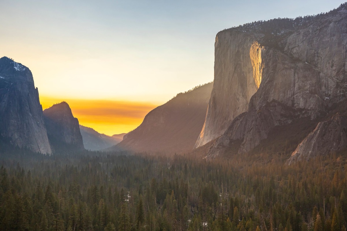 Yosemite valley sunrise over granite cliffs