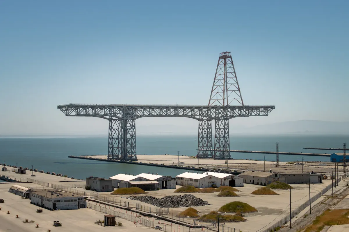 Iconic Hunter's Point Crane overlooking the San Francisco shoreline at the naval shipyard.