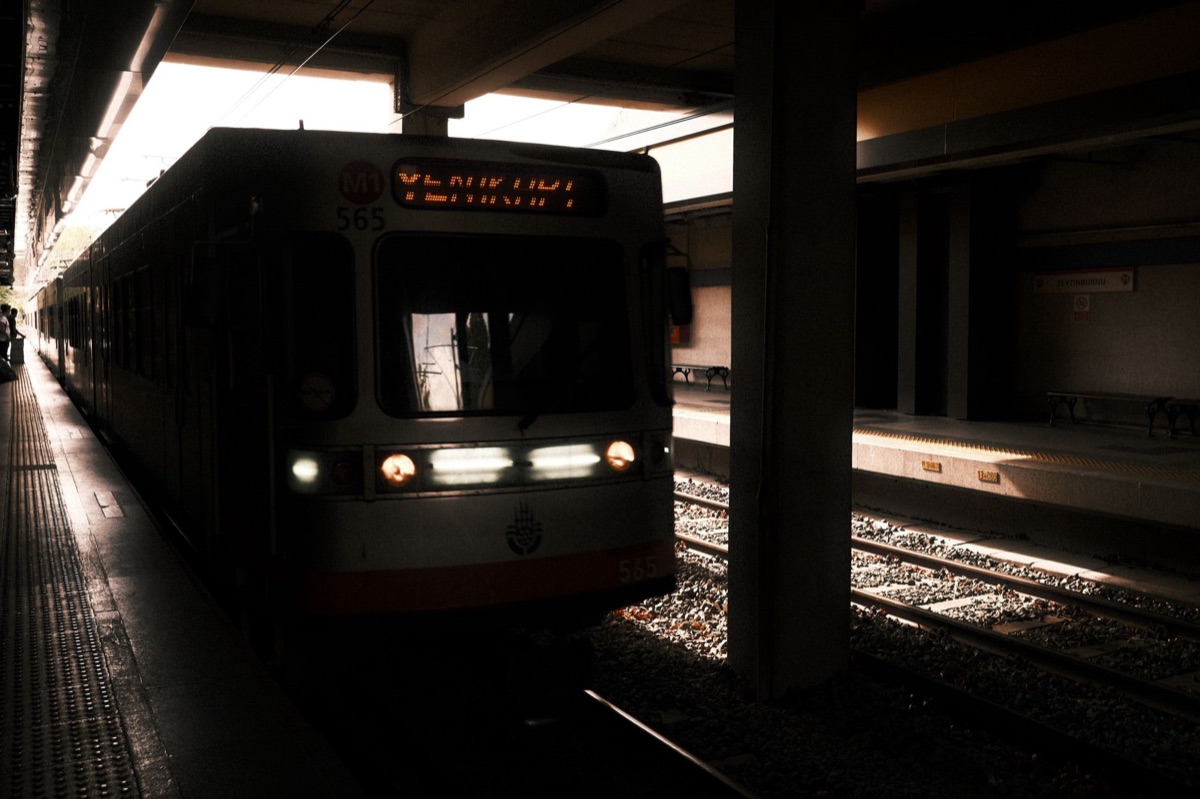 SF Muni train platform with passengers boarding